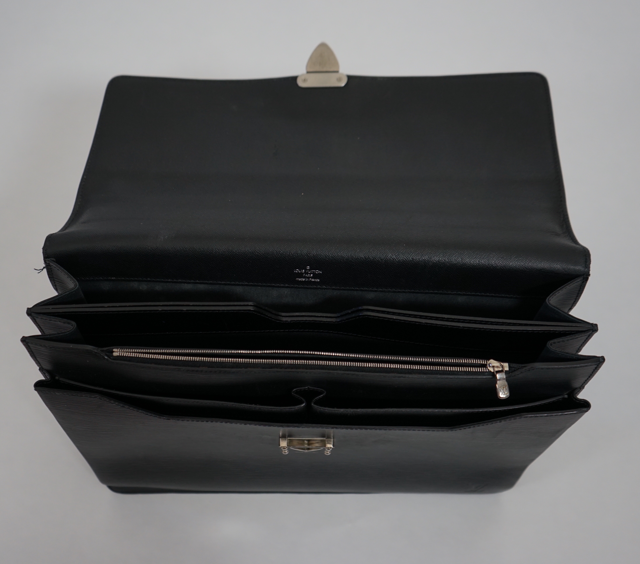 A Louis Vuitton Robusto briefcase in black taiga leather, width 41.5cm, height 33cm, depth 8cm